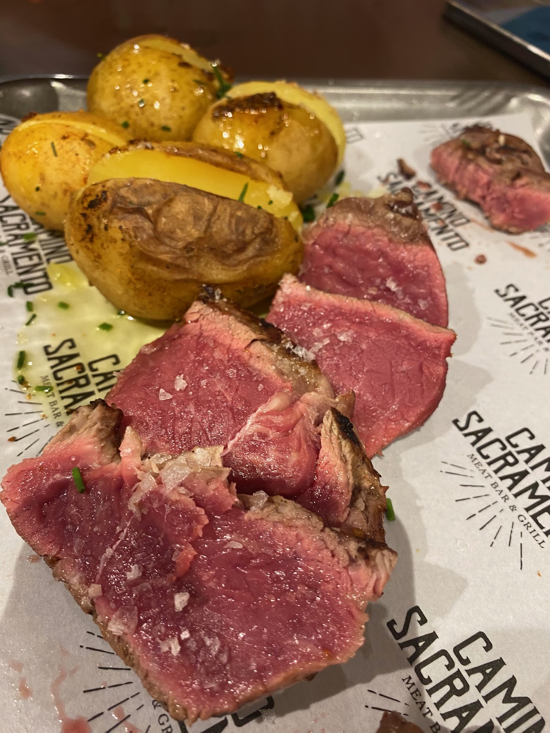 Steak and potatoes at Camino Sacramento in Madrid