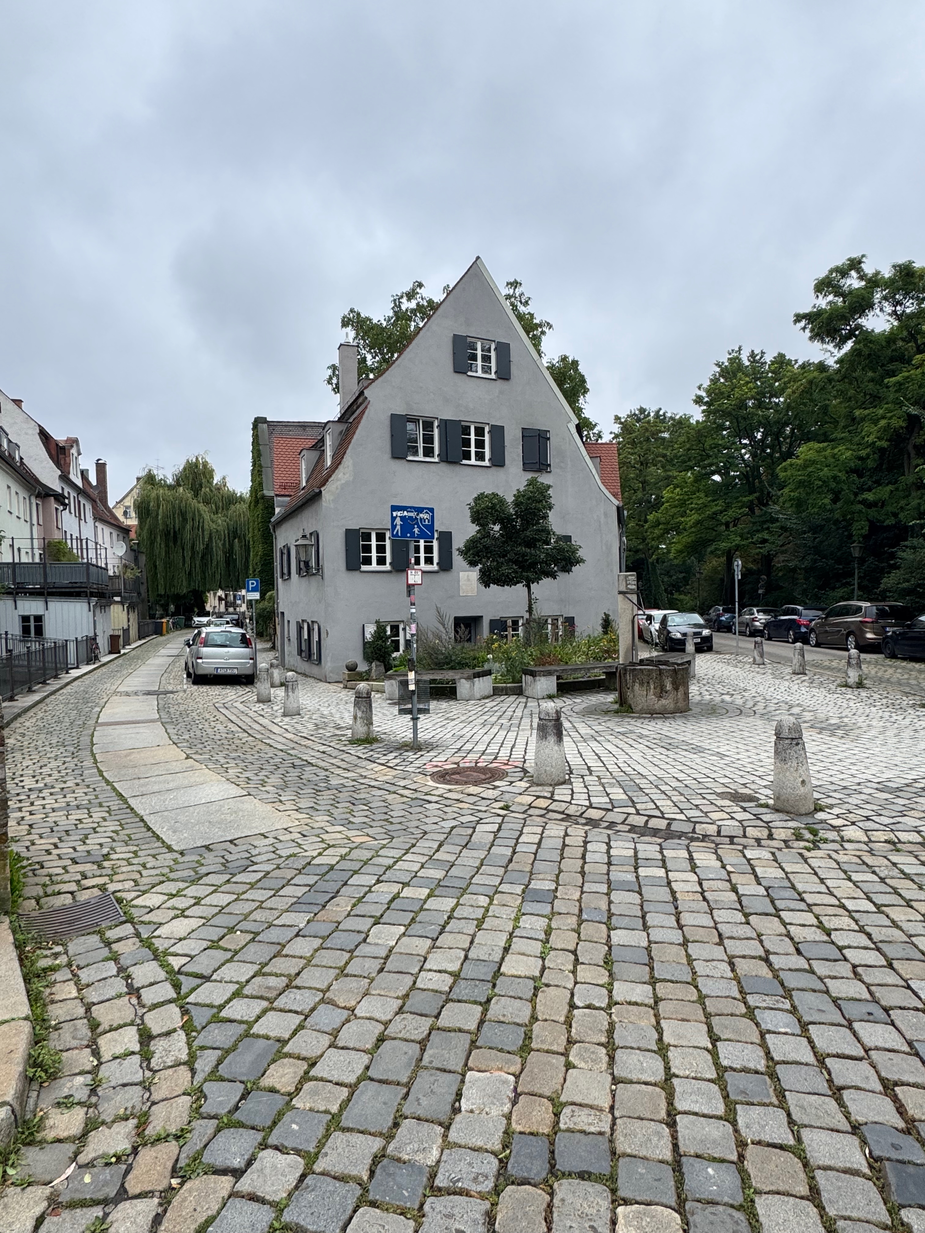 Cobblestone lane near the Red Gate waterworks in Augsburg