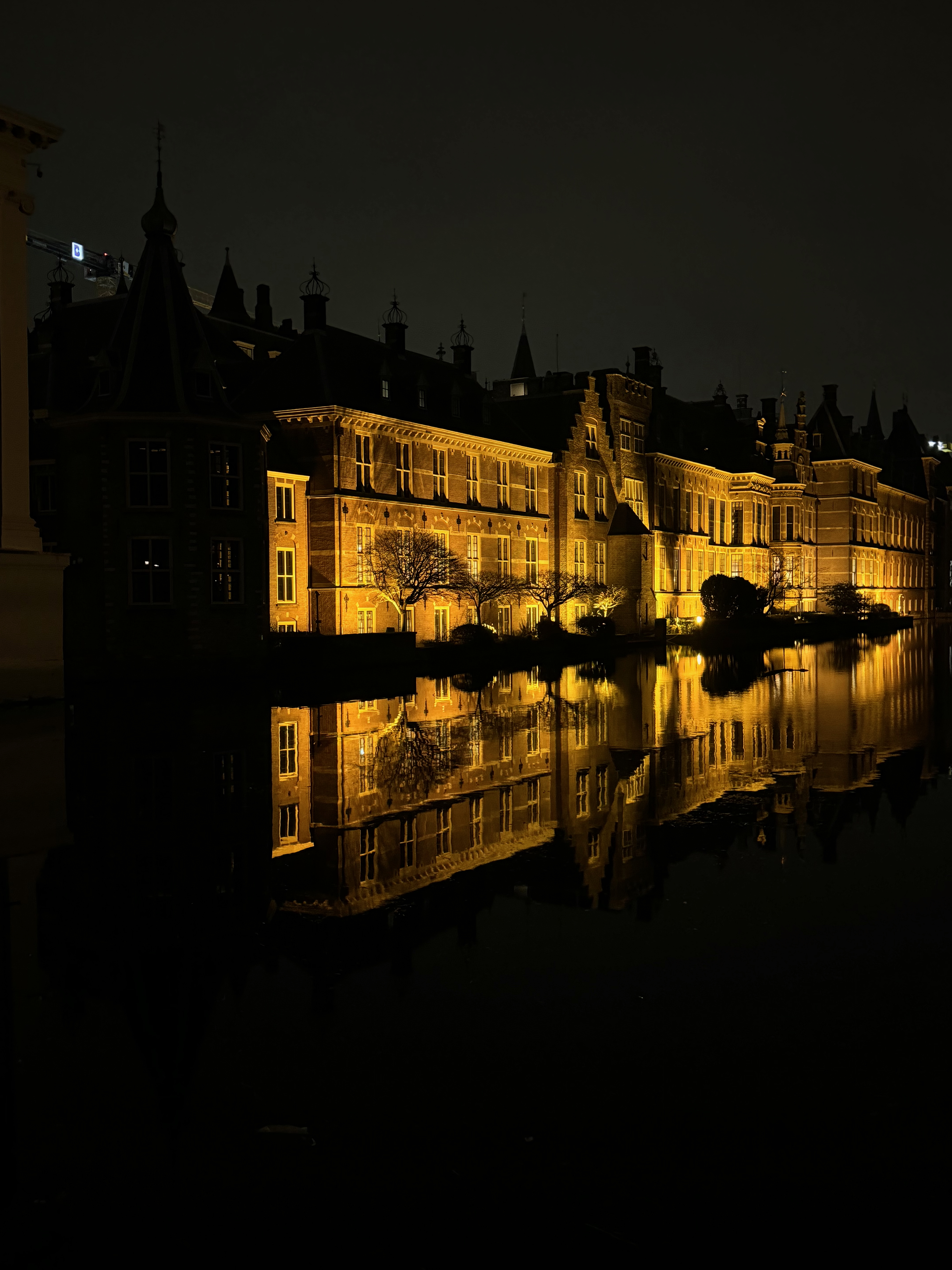The Binnenhof and Hofvijver lit up at night in The Hague
