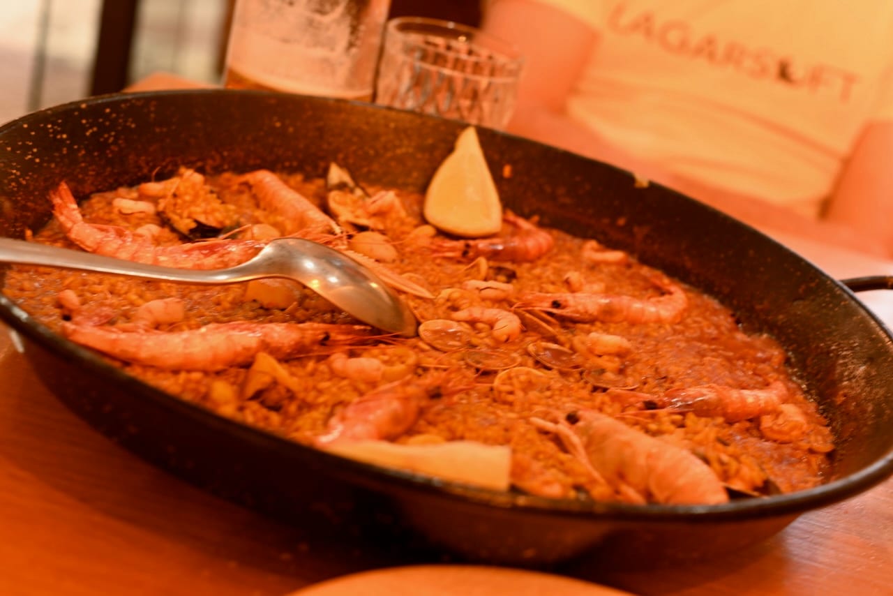 Seafood rice served in a paella pan in Alicante