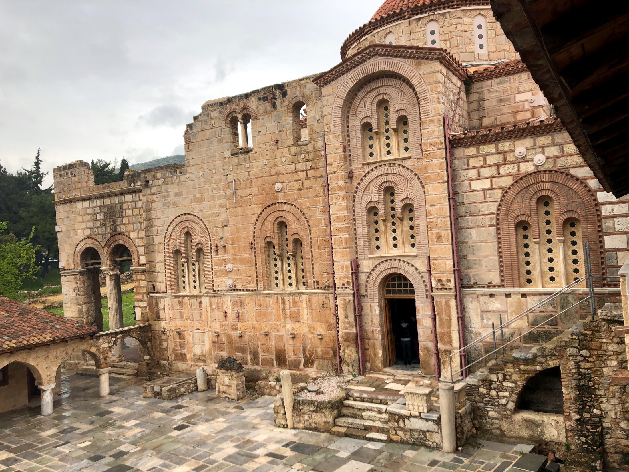 Daphni Monastery courtyard and Byzantine church outside Athens
