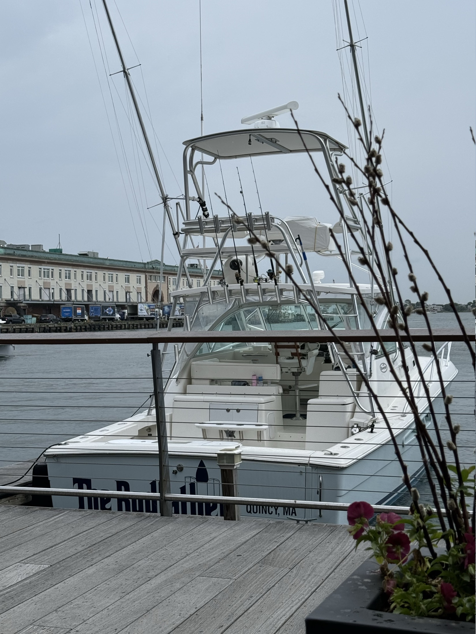 Boats tied up along Boston Harbor near the Seaport