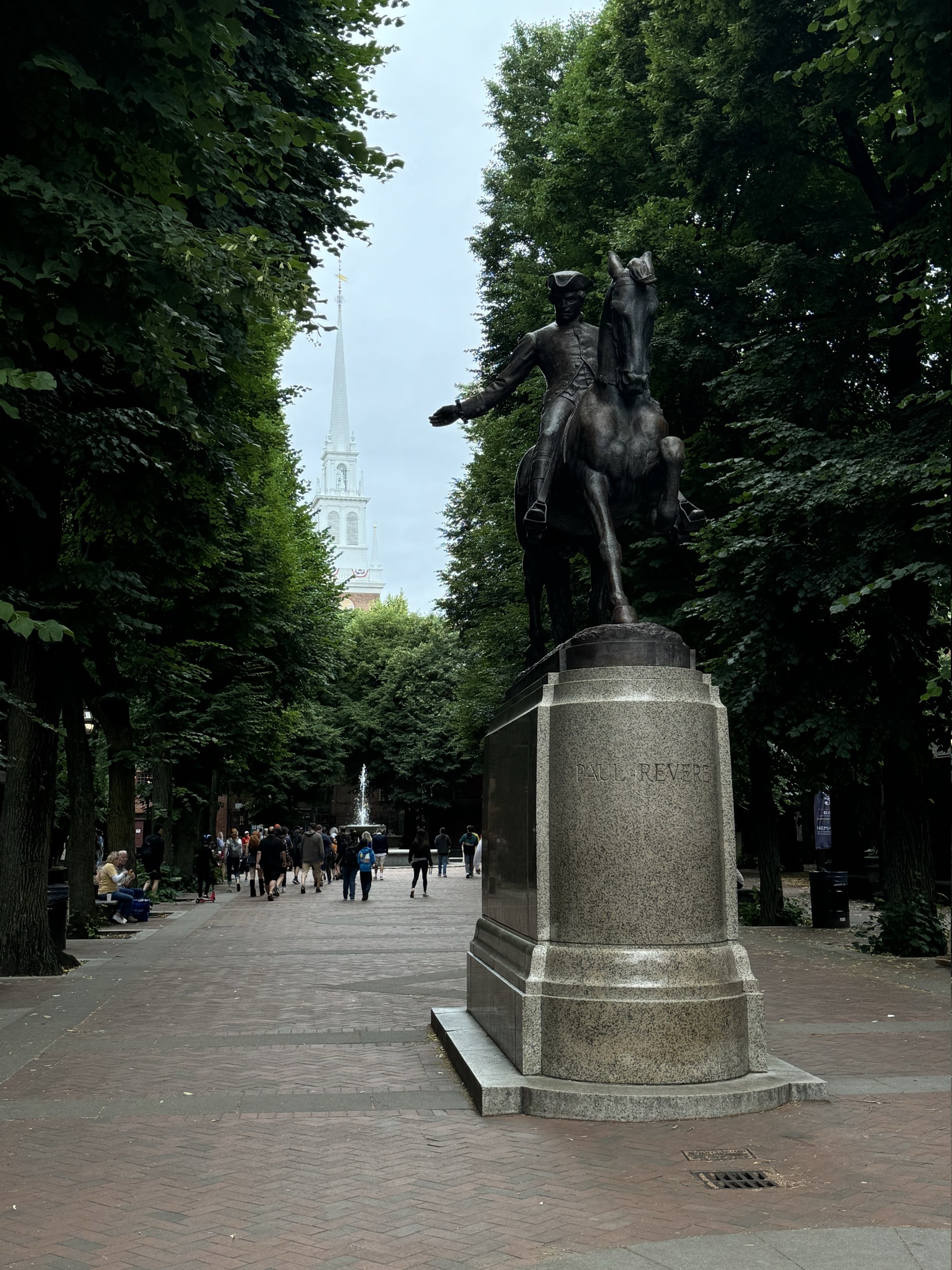 The Paul Revere Mall with the Old North Church steeple behind it in Boston
