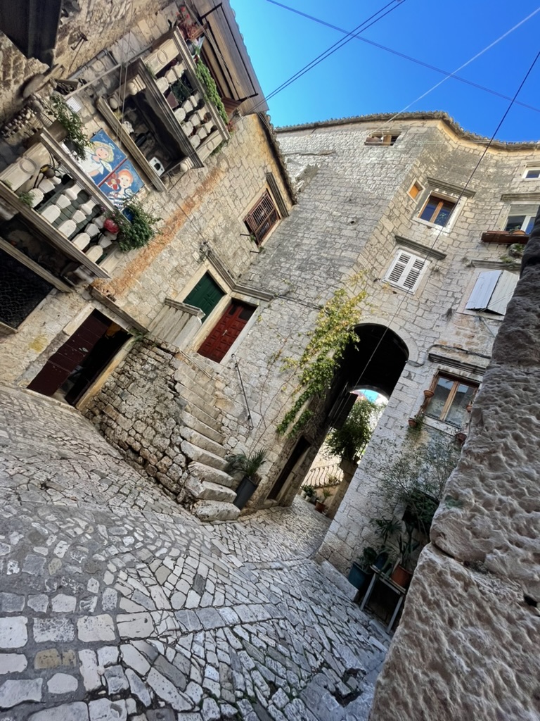 A crooked stone lane inside Trogir old town