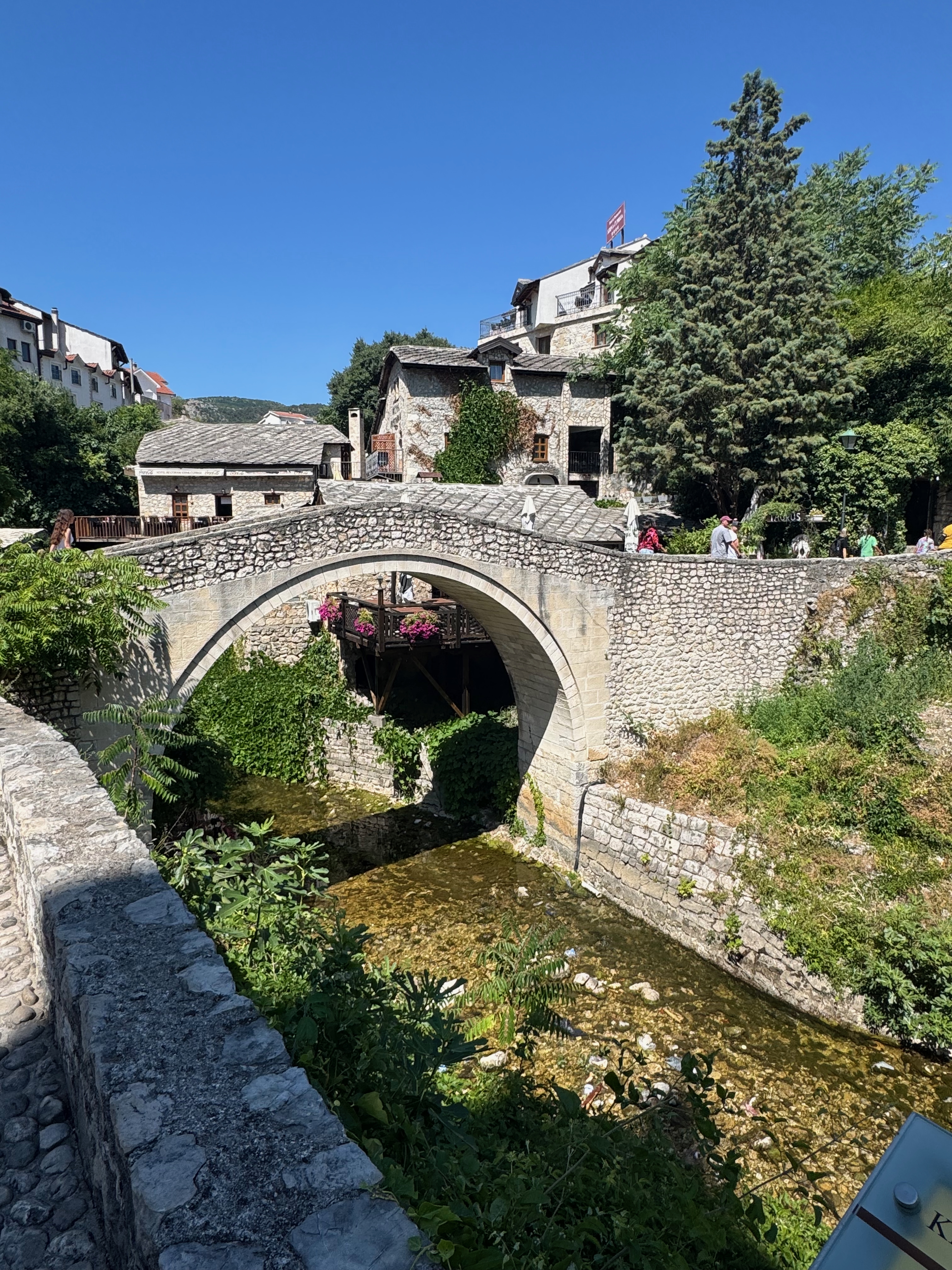 Kriva Ćuprija stone bridge over the Radobolja stream in Mostar