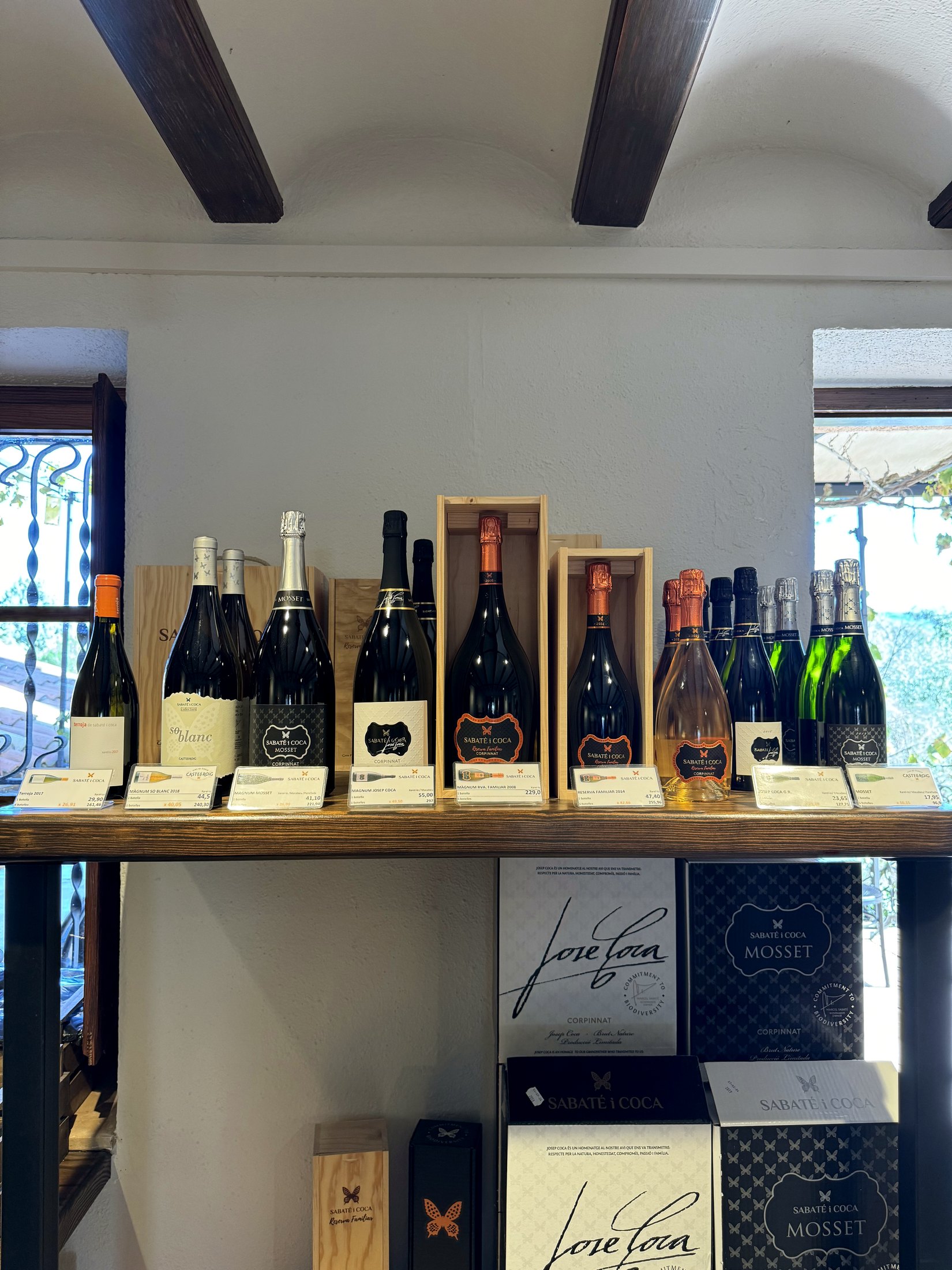 Wine bottles on display during a Penedes cellar visit