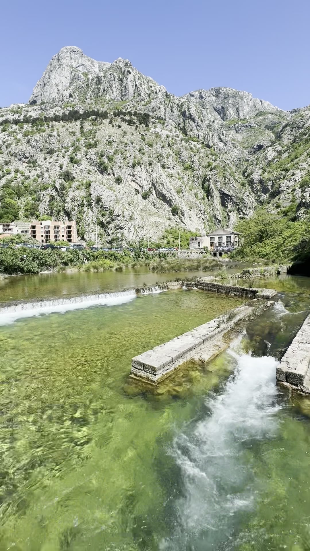 The river and cliffs behind Kotor old town near the old hydroelectric plant